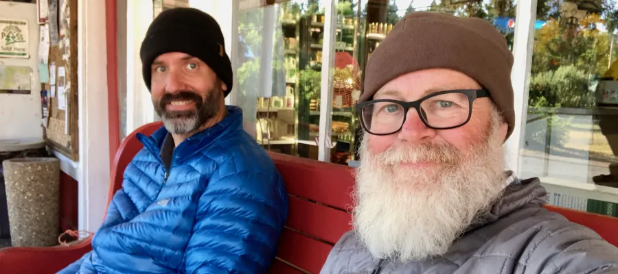 Dave and Gravity on the porch of Trout Lake General Store
