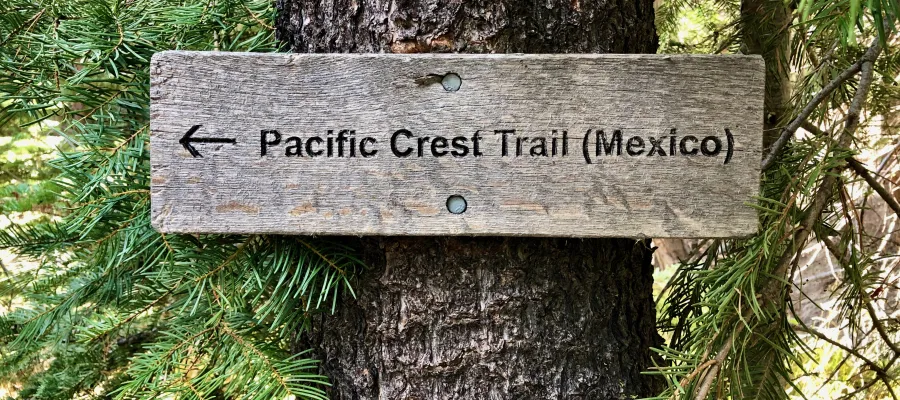 A sign on the PCT points the direction to Mexico