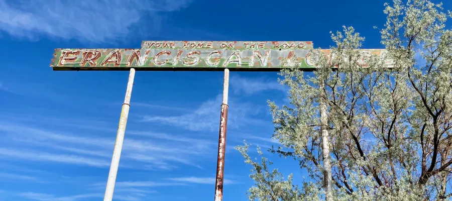 A sign for the closed Franciscan Lodge in Grants, NM