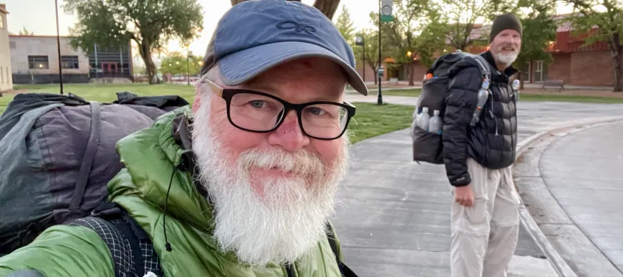 Gravity and Top O' wait for a bus in Alamosa
