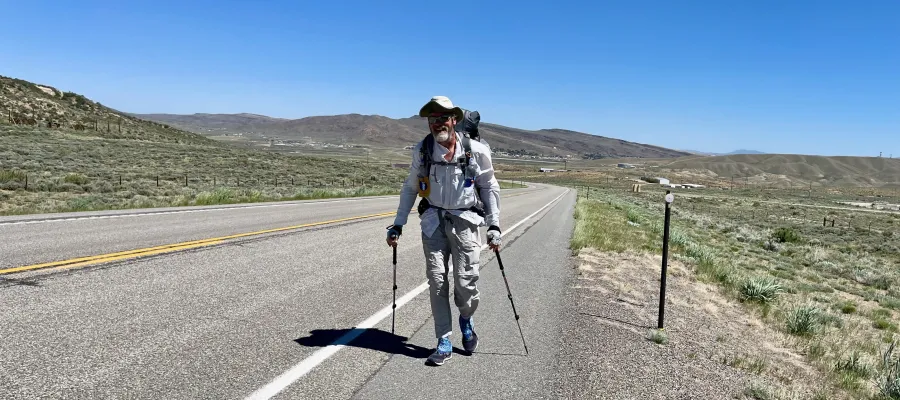 Top O' walks against the wind in the Great Divide Basin