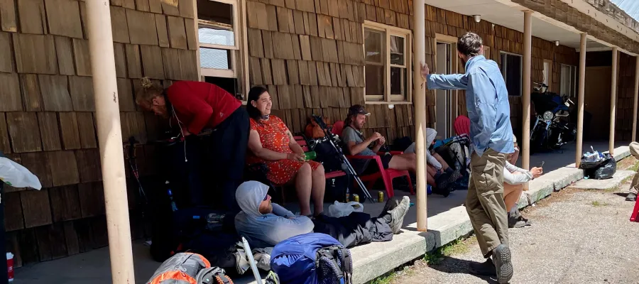 Hikers hanging out at the Y Motel in Chama, New Mexico