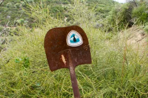Rusty shovel with PCT emblem