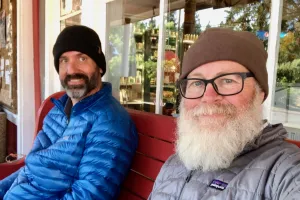 Dave and Gravity on the porch of Trout Lake General Store