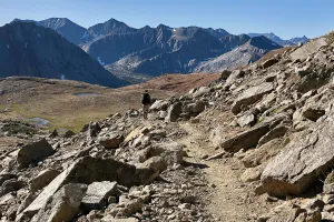 A hiker descends from Pinchot Pass