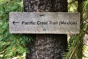 A sign on the PCT points the direction to Mexico
