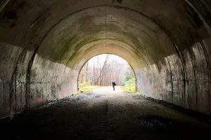 Tengo Hambre stands at the end of a tunnel