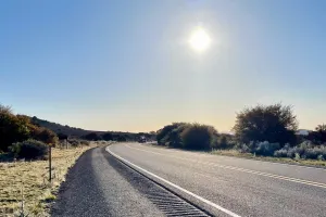 The sun shines over State Route 90