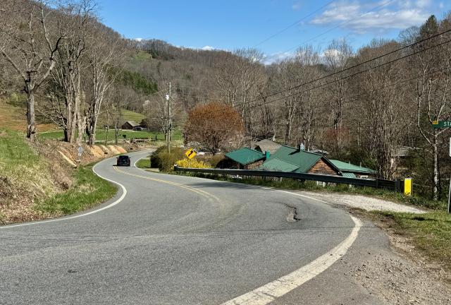 Kim drives away from the Bowlens Creek Trailhead
