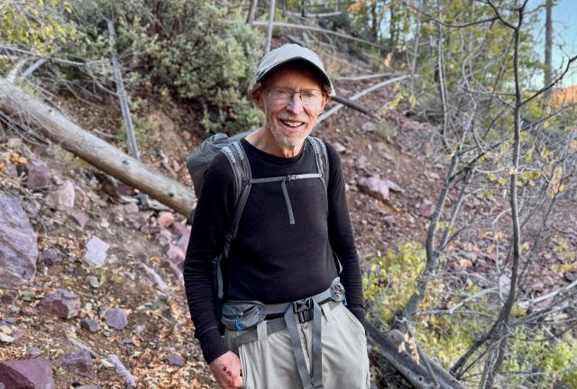Gene, a hiker who always hikes northbound to avoid too much sun exposure