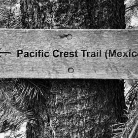 A sign on the PCT points the direction to Mexico
